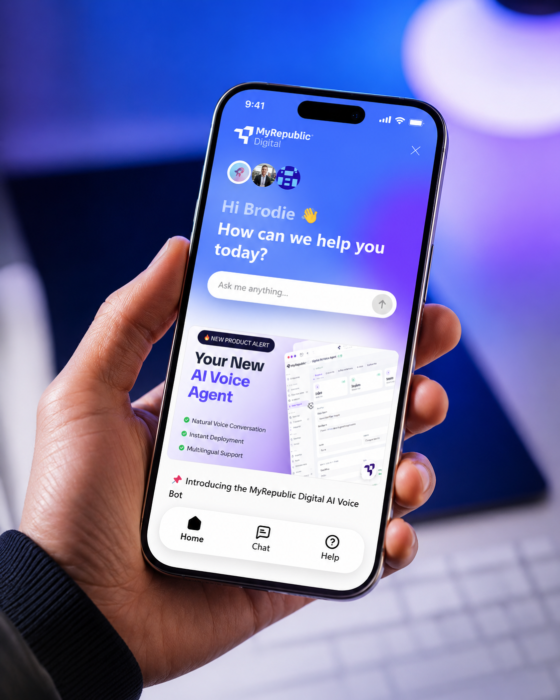 Small business founder holding a phone with the MyRepublic Digital AI chat experience open